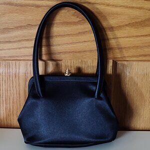 La Regale Ltd navy blue mini purse, excellent to like new condition